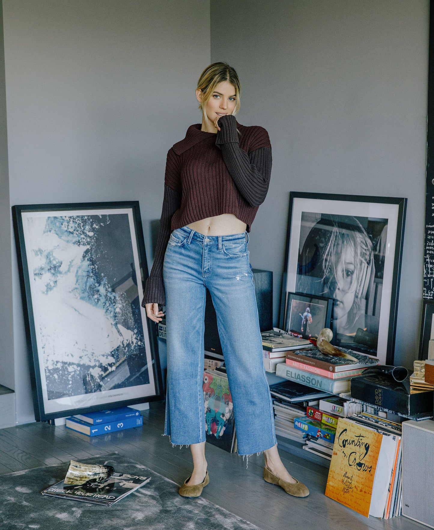 editorial image of Supported - High Rise Raw Hem Slim Wide Leg Jeans