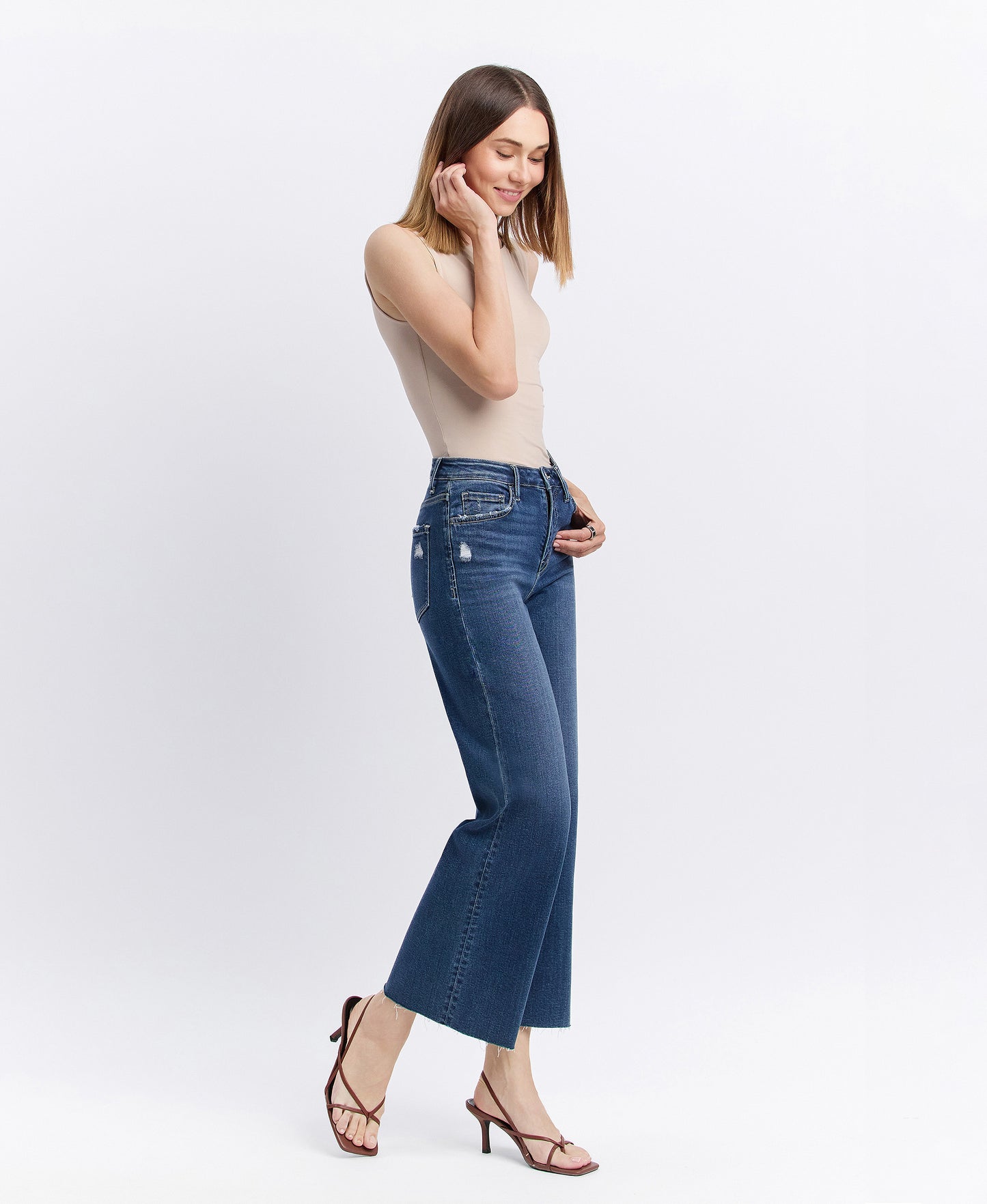 Right 45 degrees product image of Interlude - High Rise Clean Cut Raw Hem Crop Wide Leg Jeans