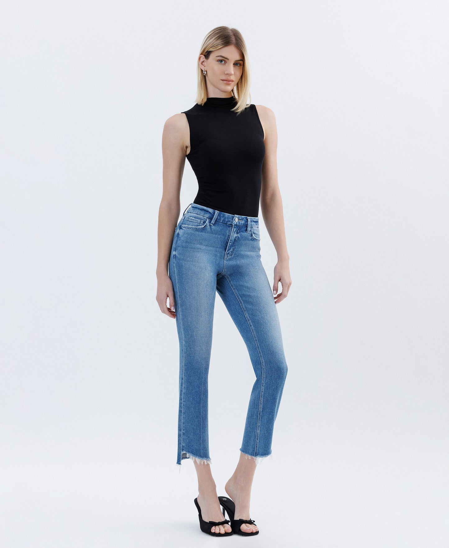 Right 45 degrees product image of Instinctive - High Rise Raw Slant Hem Slim Straight Jeans