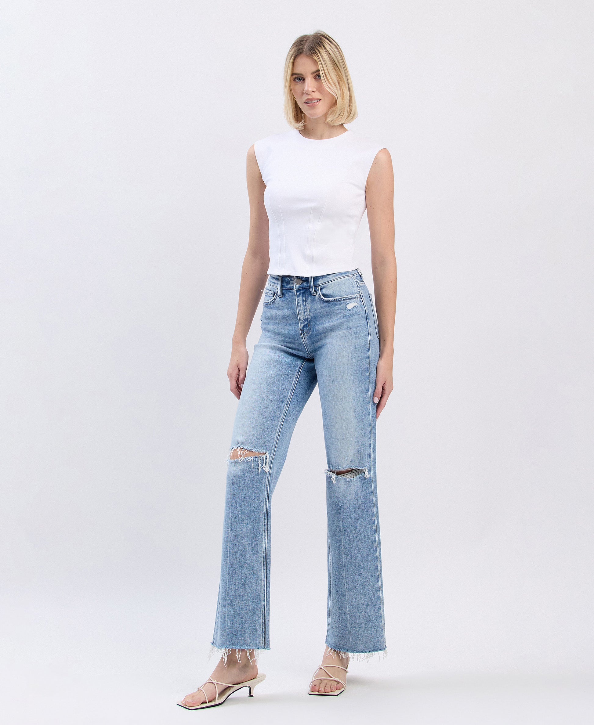 Left 45 degrees product image of Glorietta - High Rise Distressed Slim Wide Leg Jeans