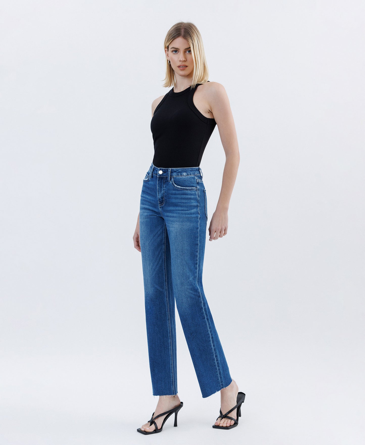 Left 45 degrees product image of Raptureously - High Rise Clean Cut Raw Hem Straight Jeans