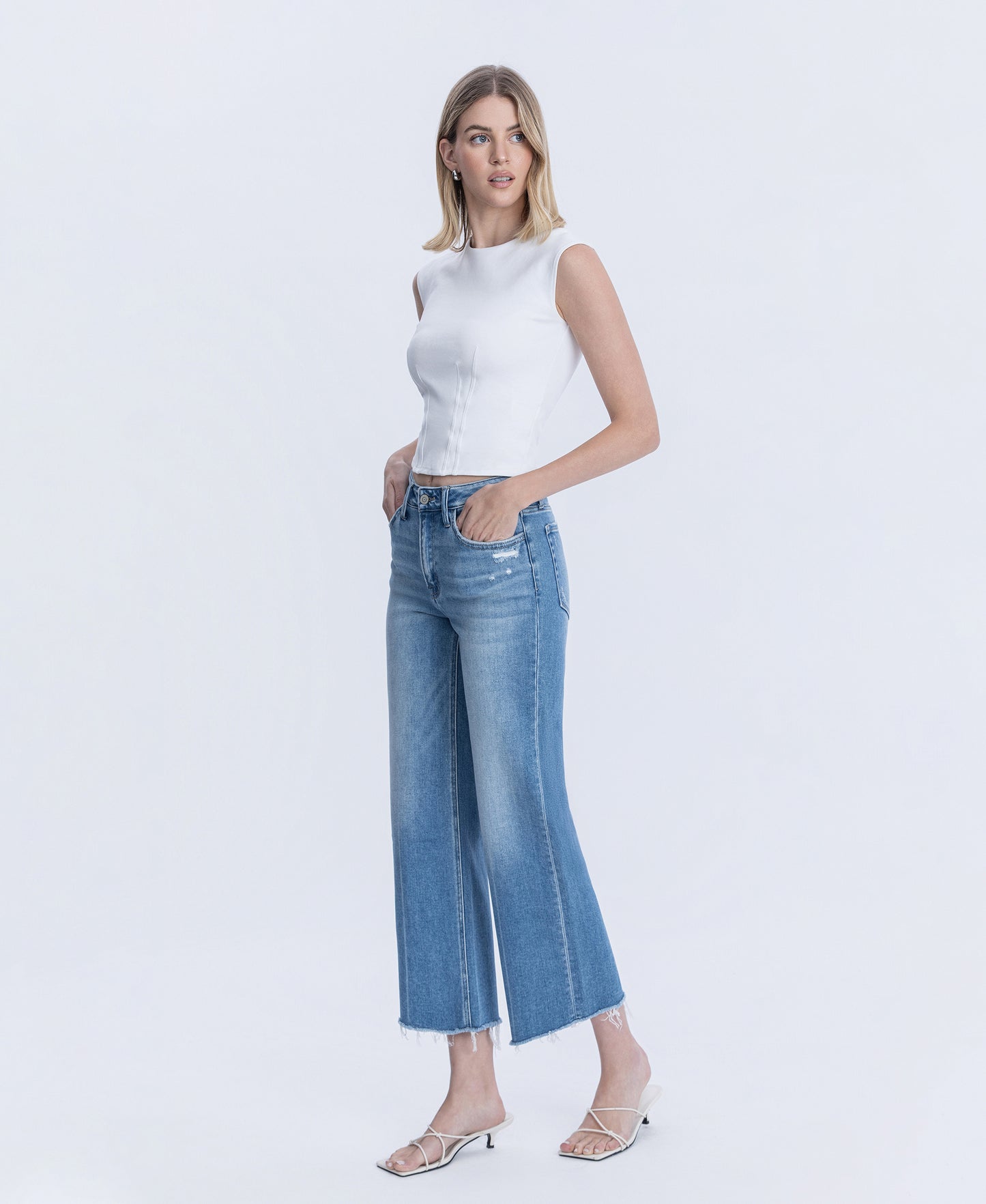 Left 45 degrees product image of Cypress - High Rise Raw Hem Crop Slim Wide Leg Jeans