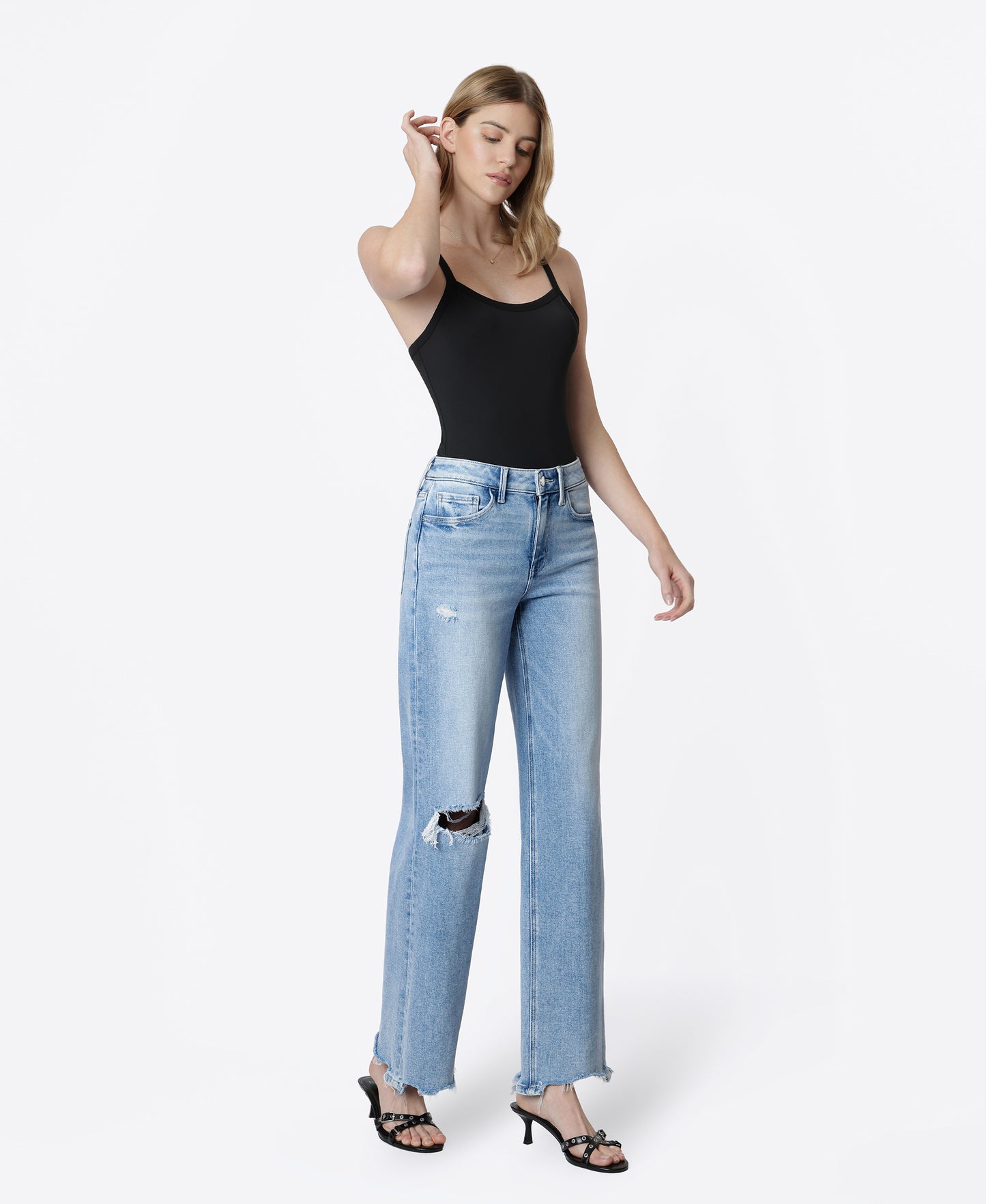 Left 45 degrees product image of Glowing - High Rise Distressed Uneven Raw Hem Wide Leg Jeans
