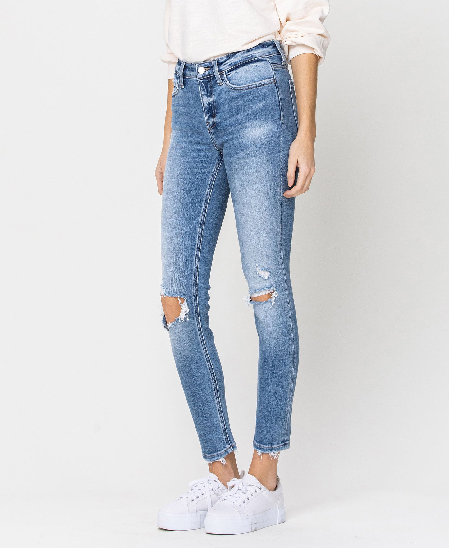Left 45 degrees product image of Distressed Tempo - Mid Rise Distressed Ankle Skinny Jeans