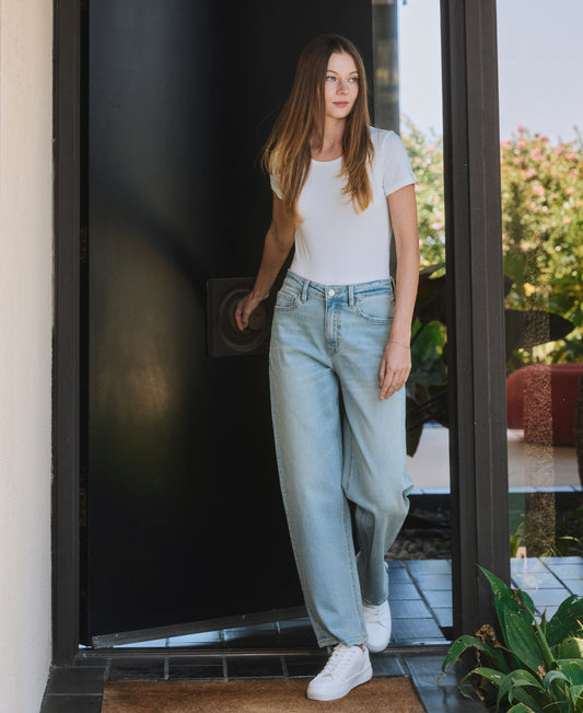 EDITORIAL IMAGE OF Blockbuster - High Rise Ankle Barrel Leg Jeans