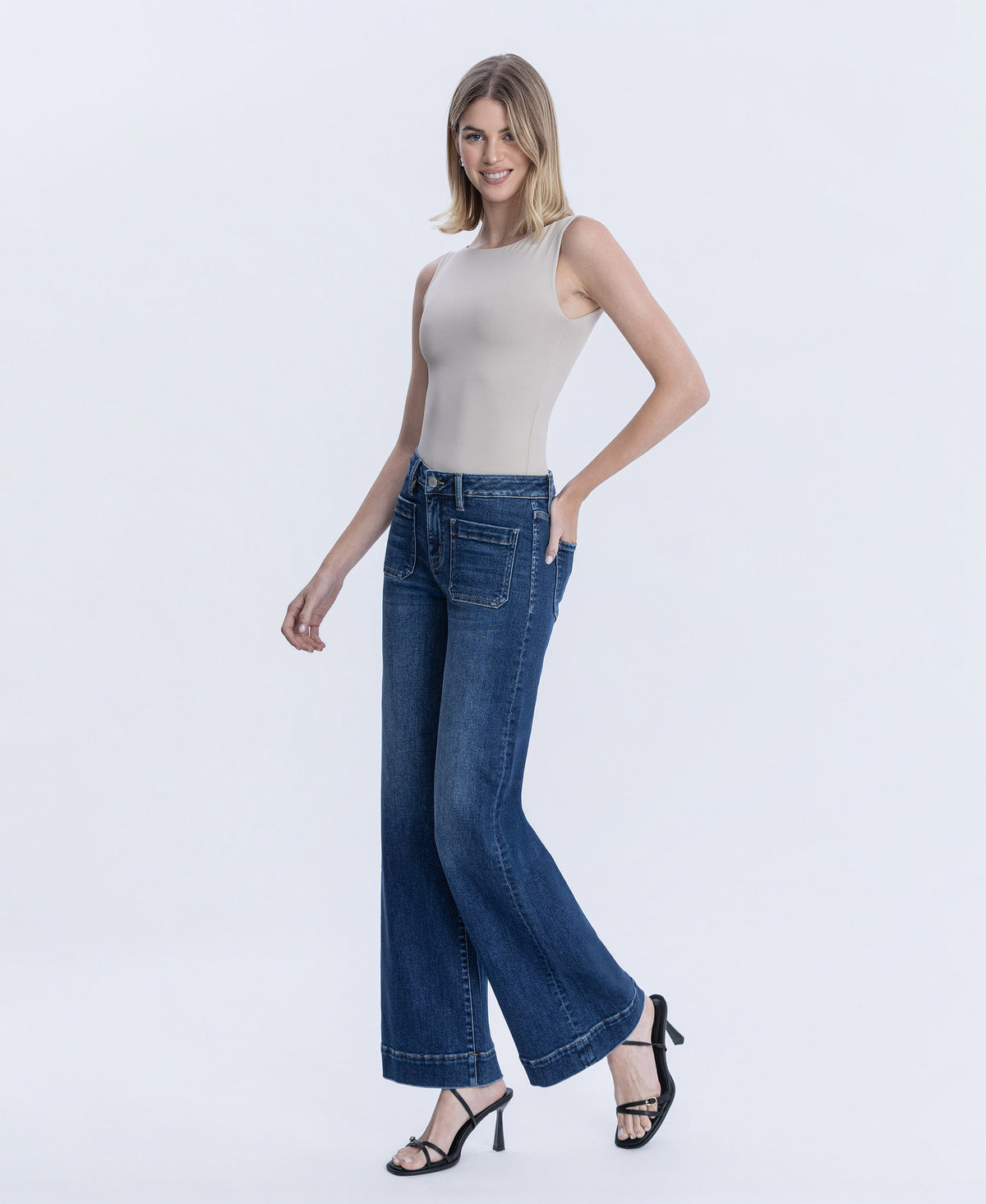 Left 45 degrees product image of Medium Light - High Rise Trouser Hem Wide Leg Jeans
