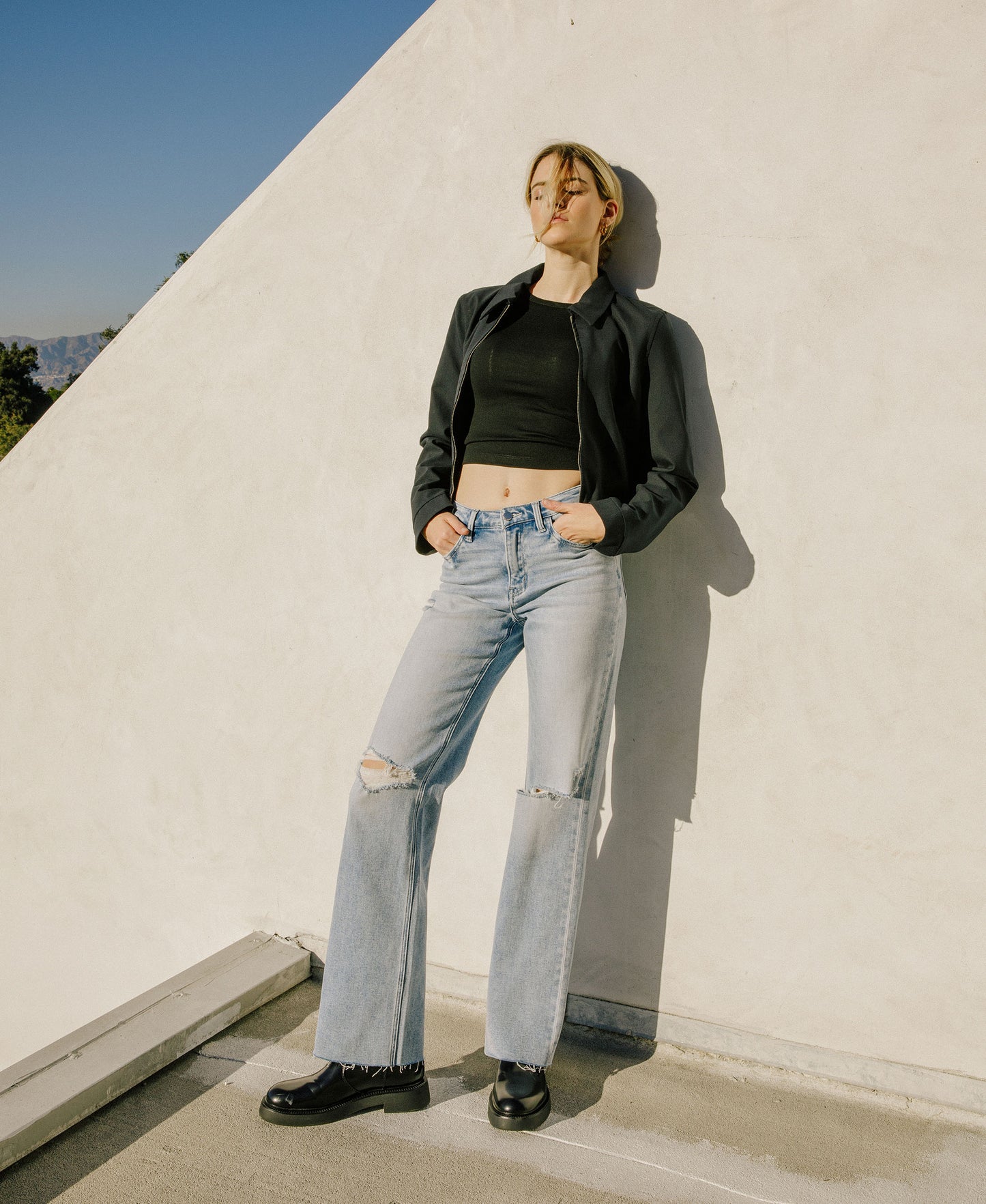 editorial image of Dexterity - High Rise Distressed Slim Wide Leg Jeans