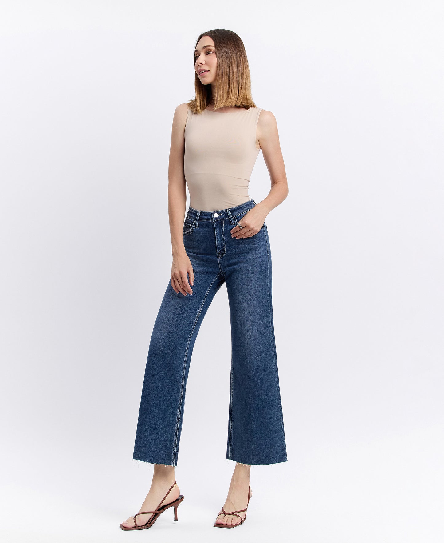Left 45 degrees product image of Interlude - High Rise Clean Cut Raw Hem Crop Wide Leg Jeans