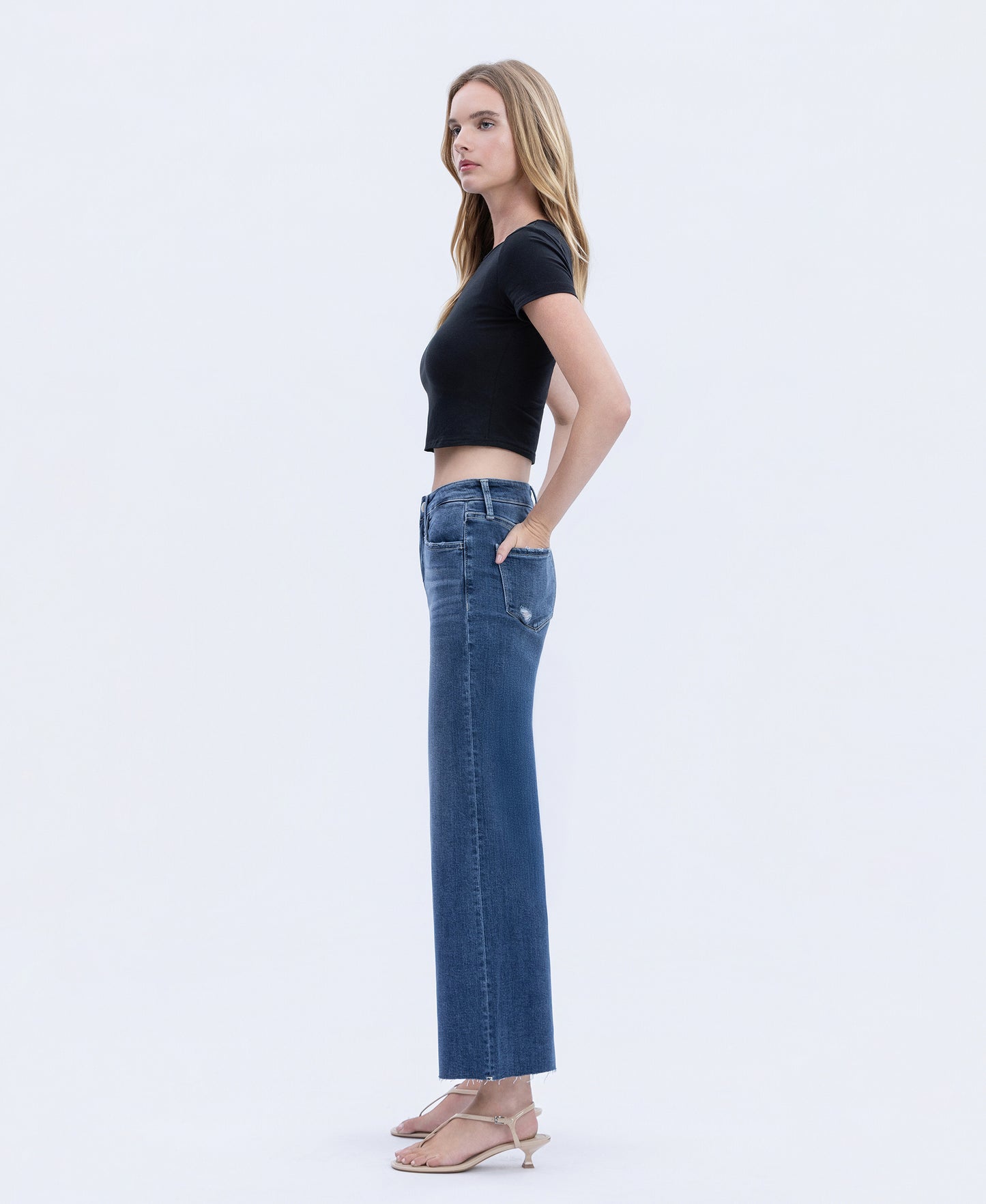 Left side product images of Interlude - High Rise Clean Cut Raw Hem Crop Wide Leg Jeans