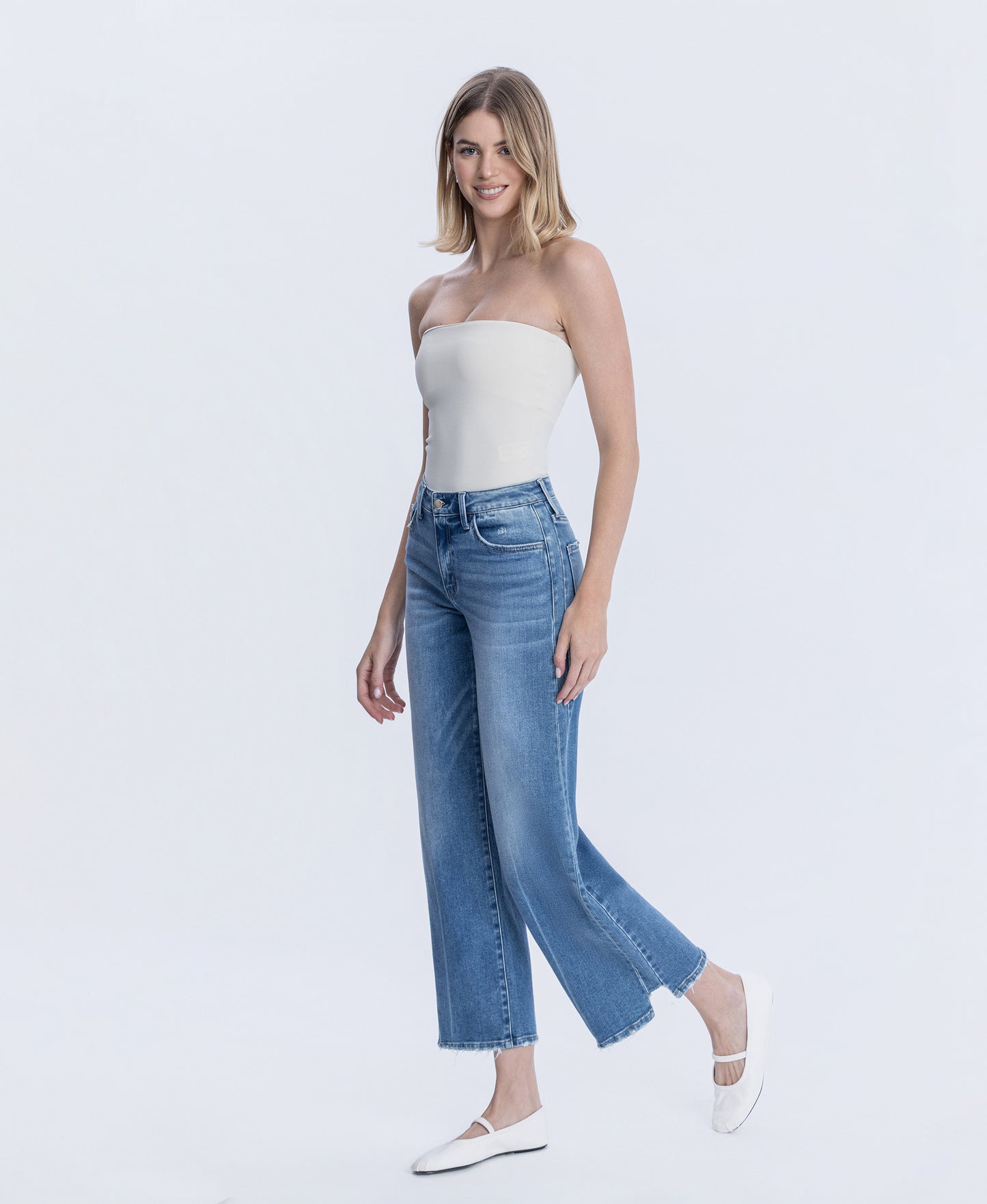 Left 45 degrees product image of Wolf N Crane - High Rise Side Panel Step Hem Ankle Wide Leg Jeans