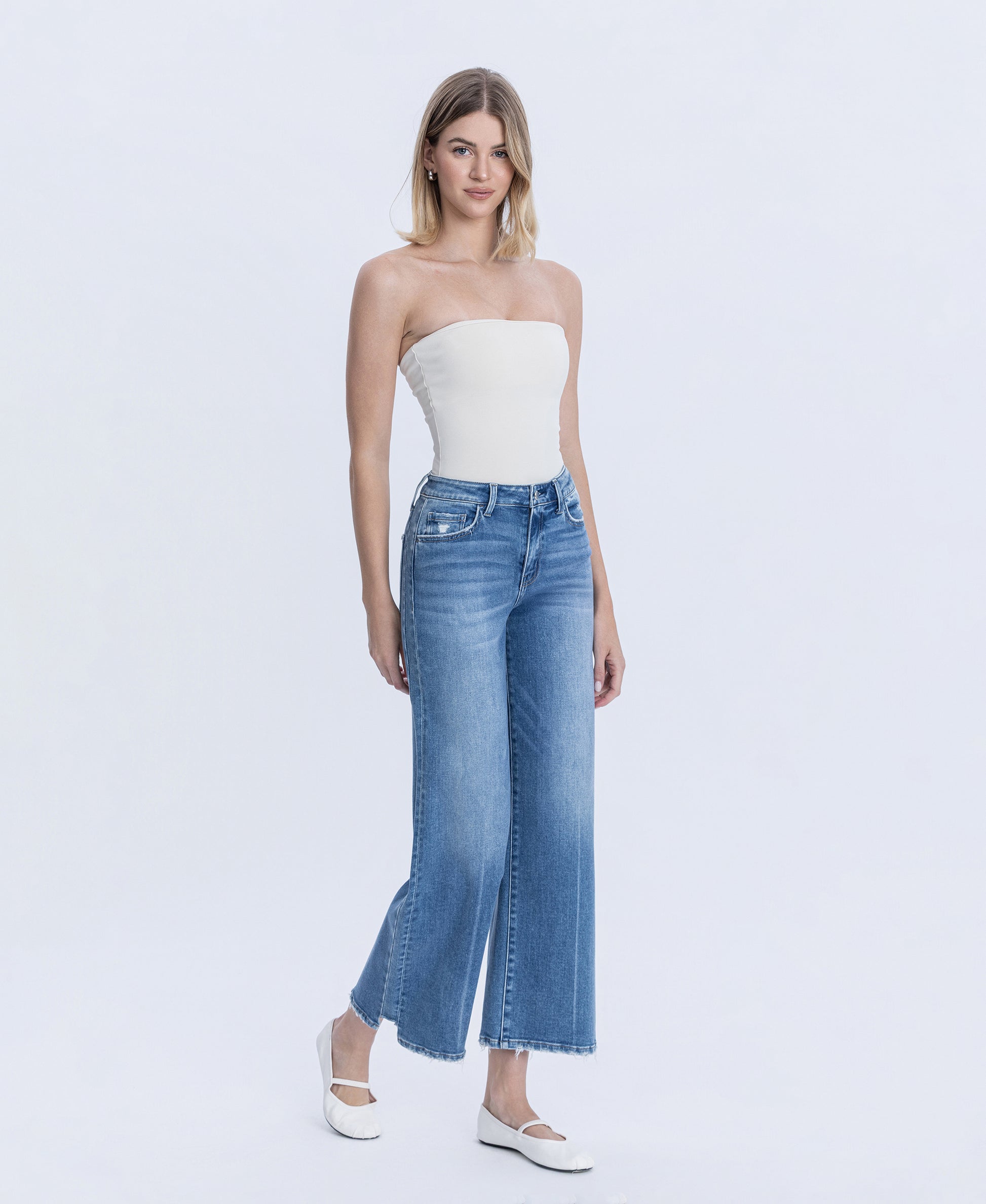 Right 45 degrees product image of Wolf N Crane - High Rise Side Panel Step Hem Ankle Wide Leg Jeans