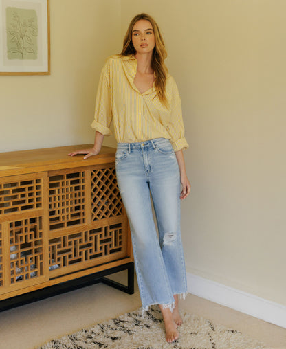 Editorial image of Ezra - High Rise Distressed Crop Slim Wide Leg Jeans