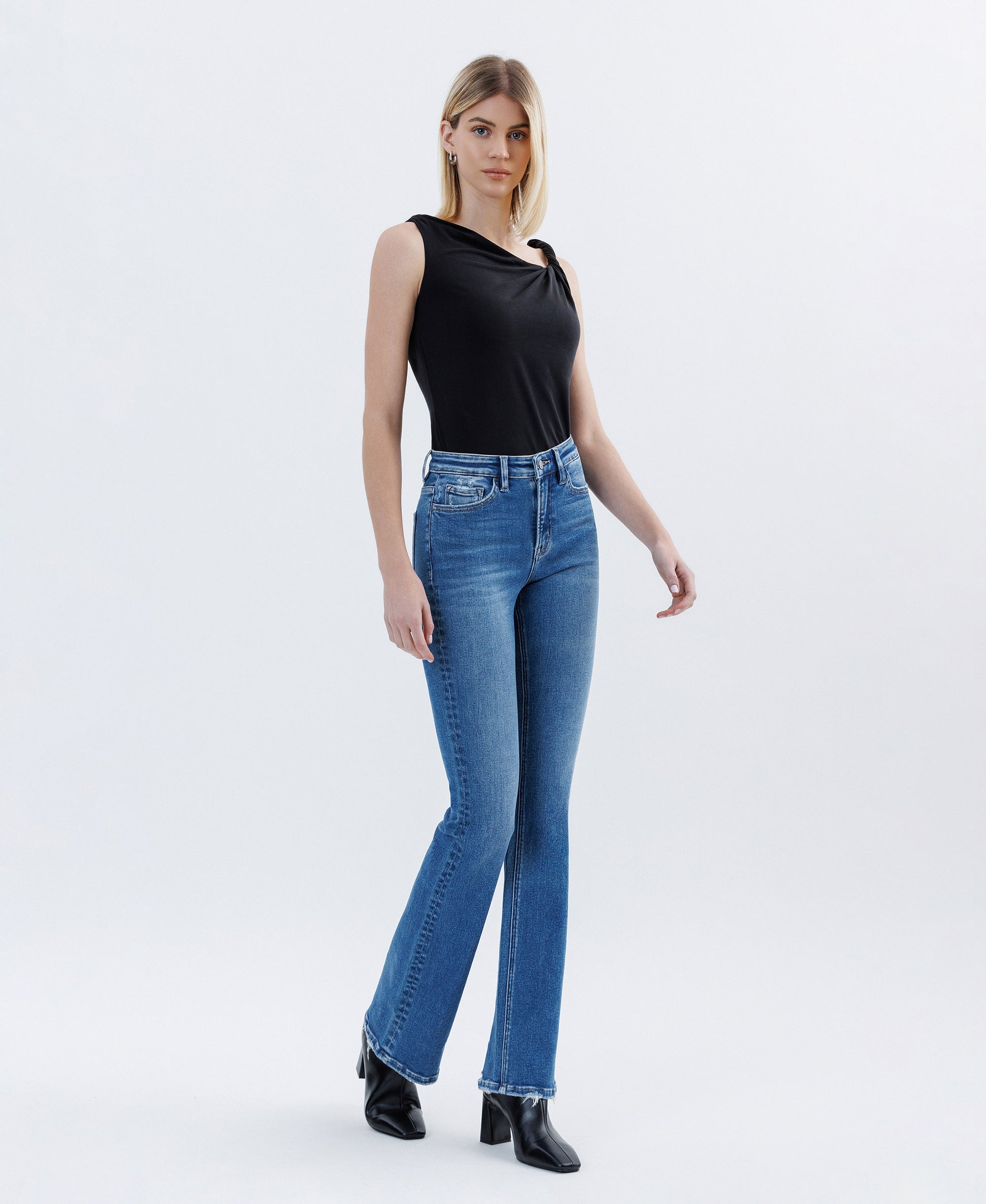 Right 45 degrees product image of Regulator - High Rise Full Length Bootcut Jeans
