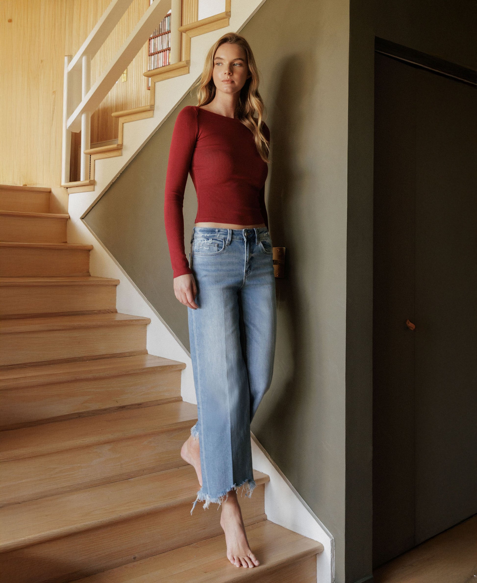 EDITORIAL IMAGE OF Celestial Light - High Rise Distressed Hem Crop Slim Wide Leg Jeans