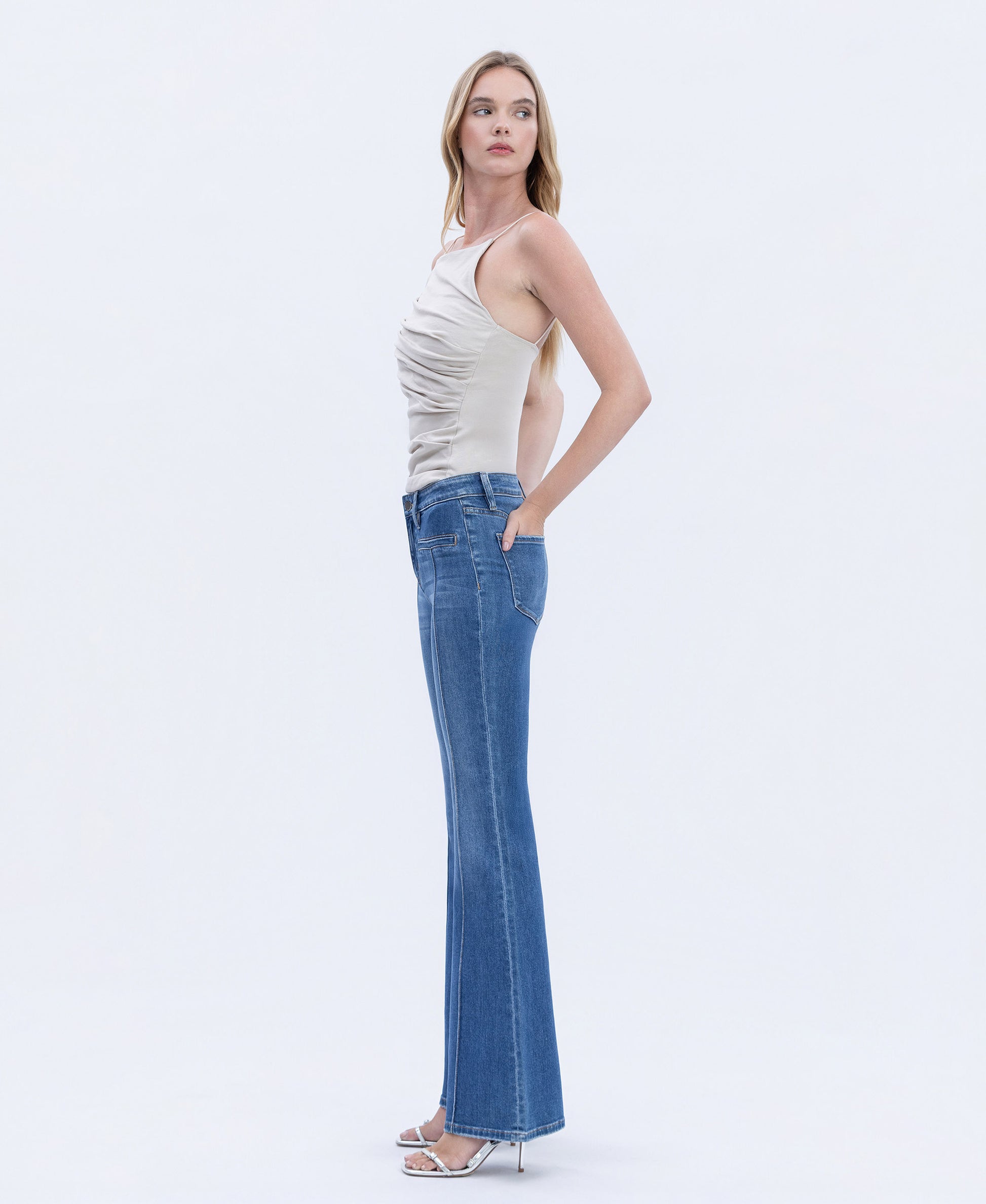 Left side product images of Inspiring - Mid Rise Welt Pocket Pin Tuck Flare Jeans