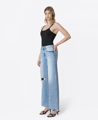 Left 45 degrees product image of Glowing - High Rise Distressed Uneven Raw Hem Wide Leg Jeans