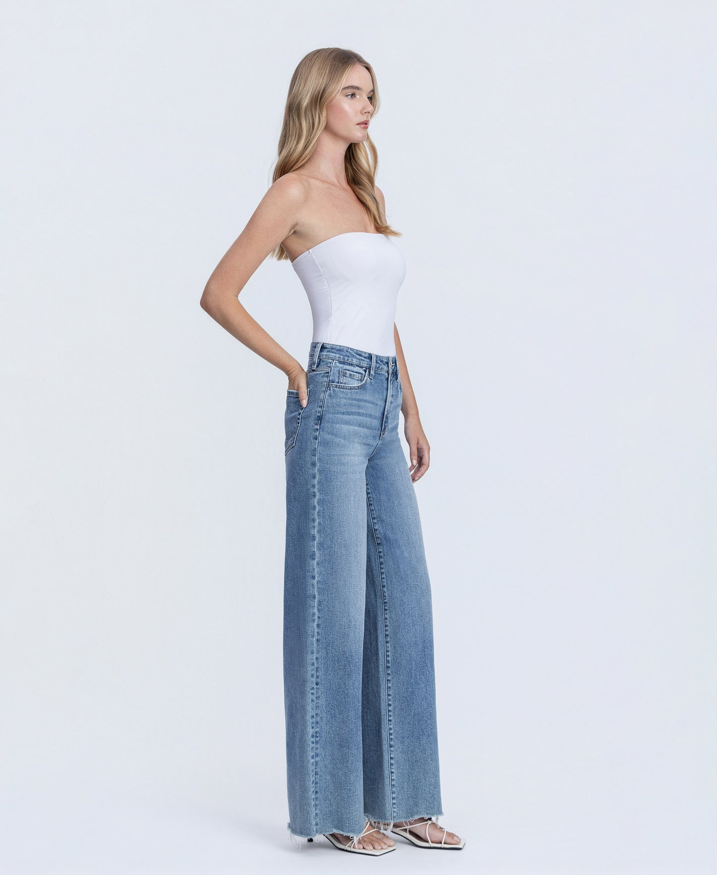 Right 45 degrees product image of Closeness - Super High Rise Raw Hem Wide Leg Jeans
