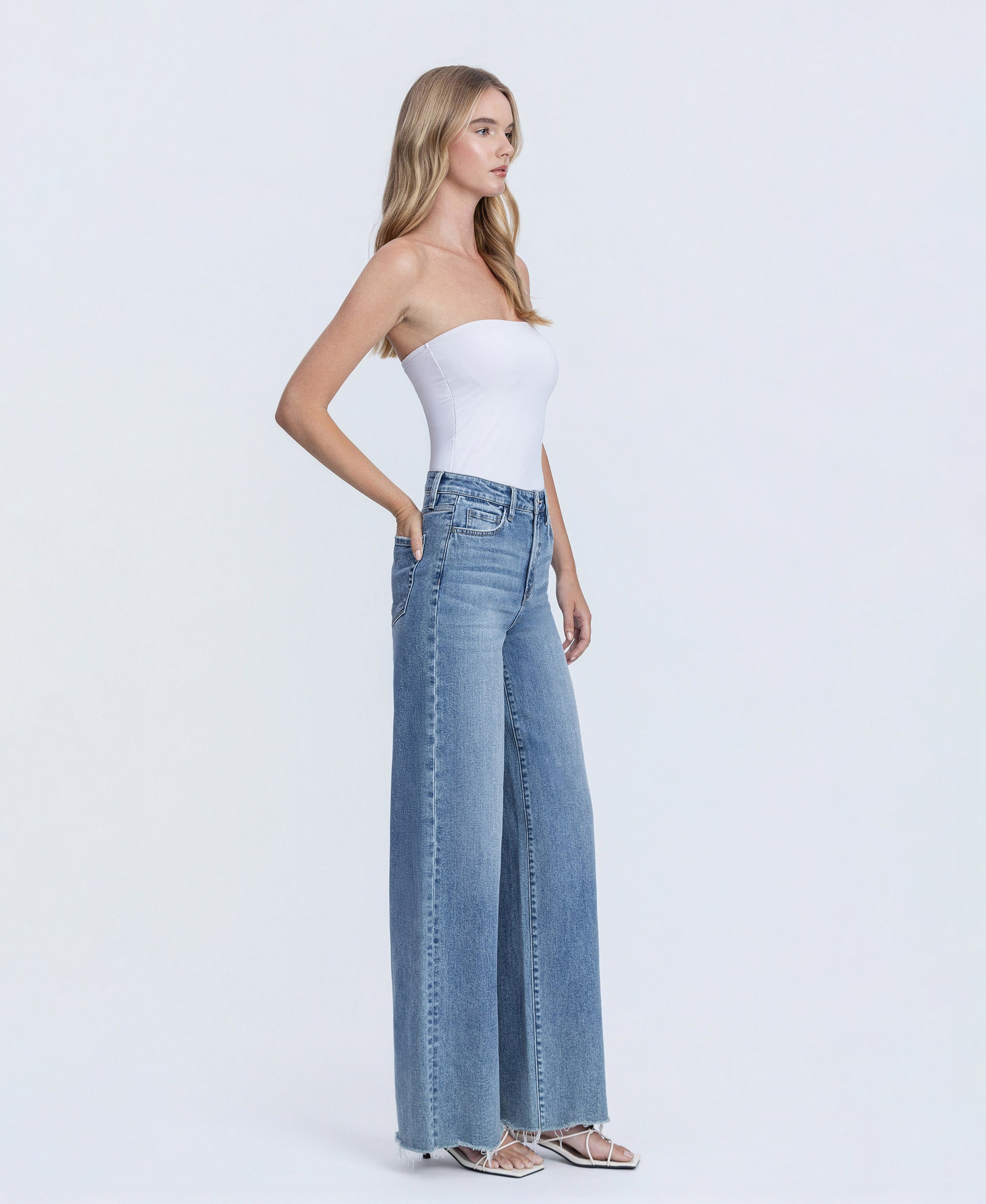 Right 45 degrees product image of Closeness - Super High Rise Raw Hem Wide Leg Jeans