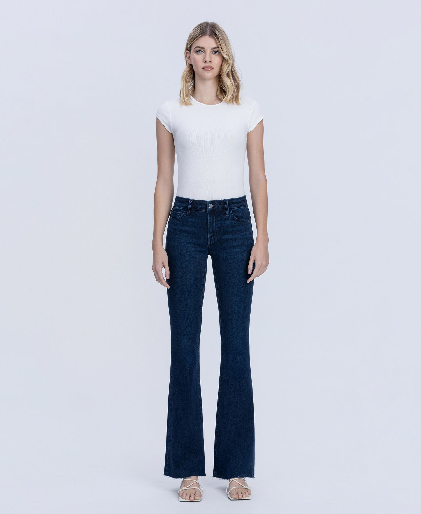 Front product images of Periwinkle - Mid Rise Raw Hem Tinted Bootcut Jeans