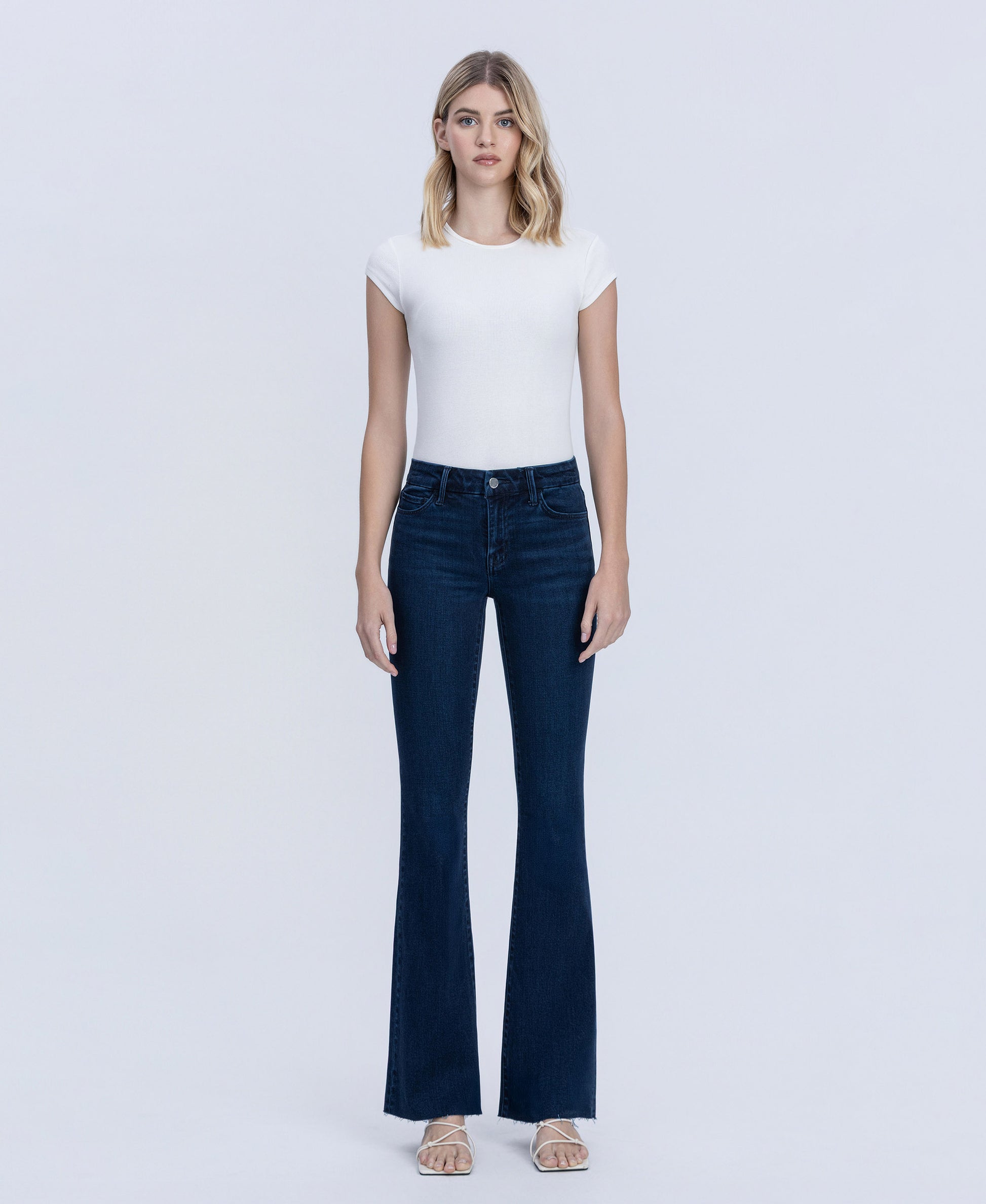 Front product images of Periwinkle - Mid Rise Raw Hem Tinted Bootcut Jeans