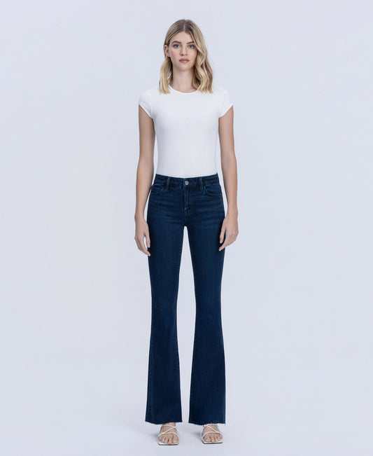 Front product images of Periwinkle - Mid Rise Raw Hem Tinted Bootcut Jeans