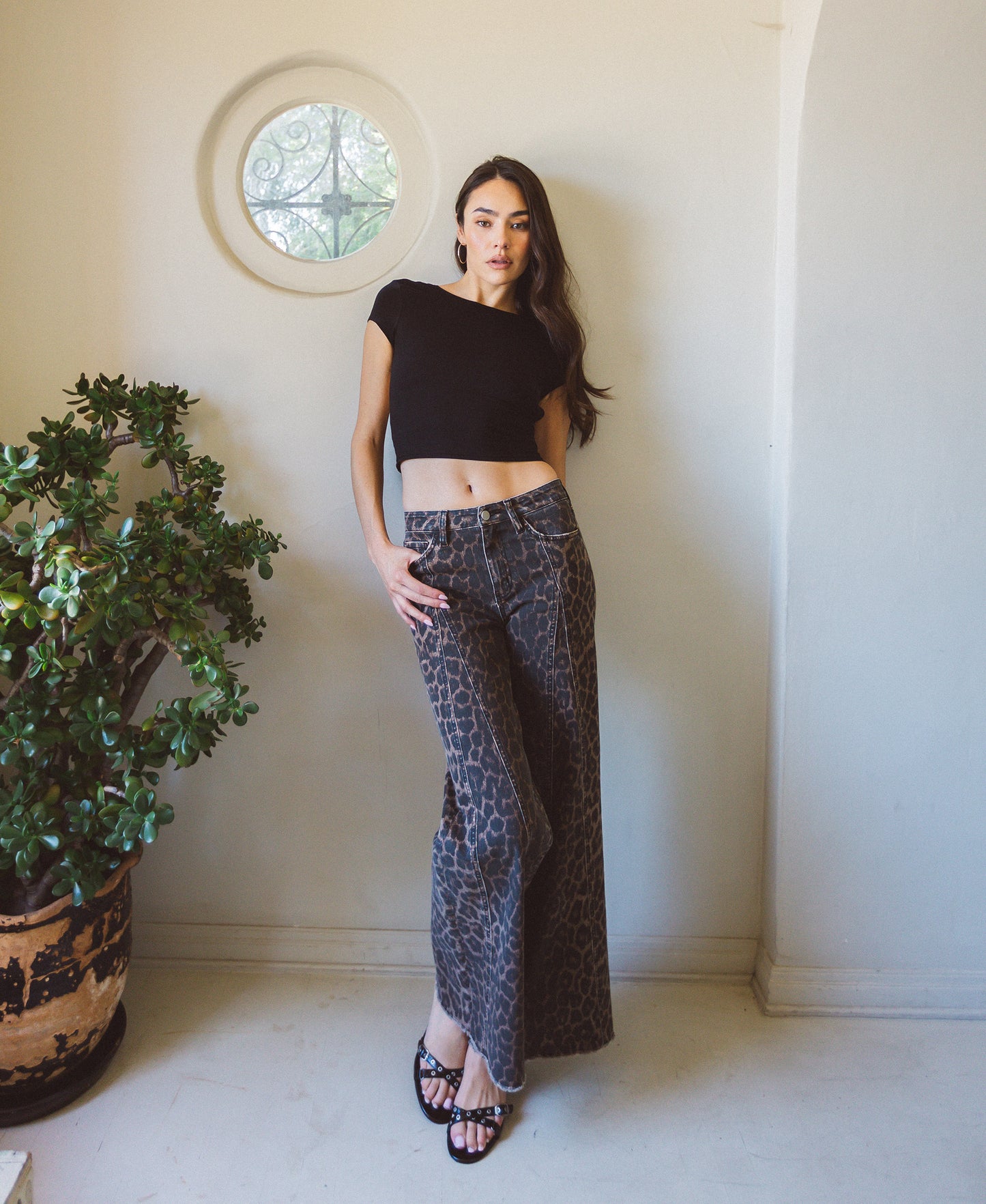 editorial image of Leopard - High Rise Raw Hem Extreme Wide Leg Jeans
