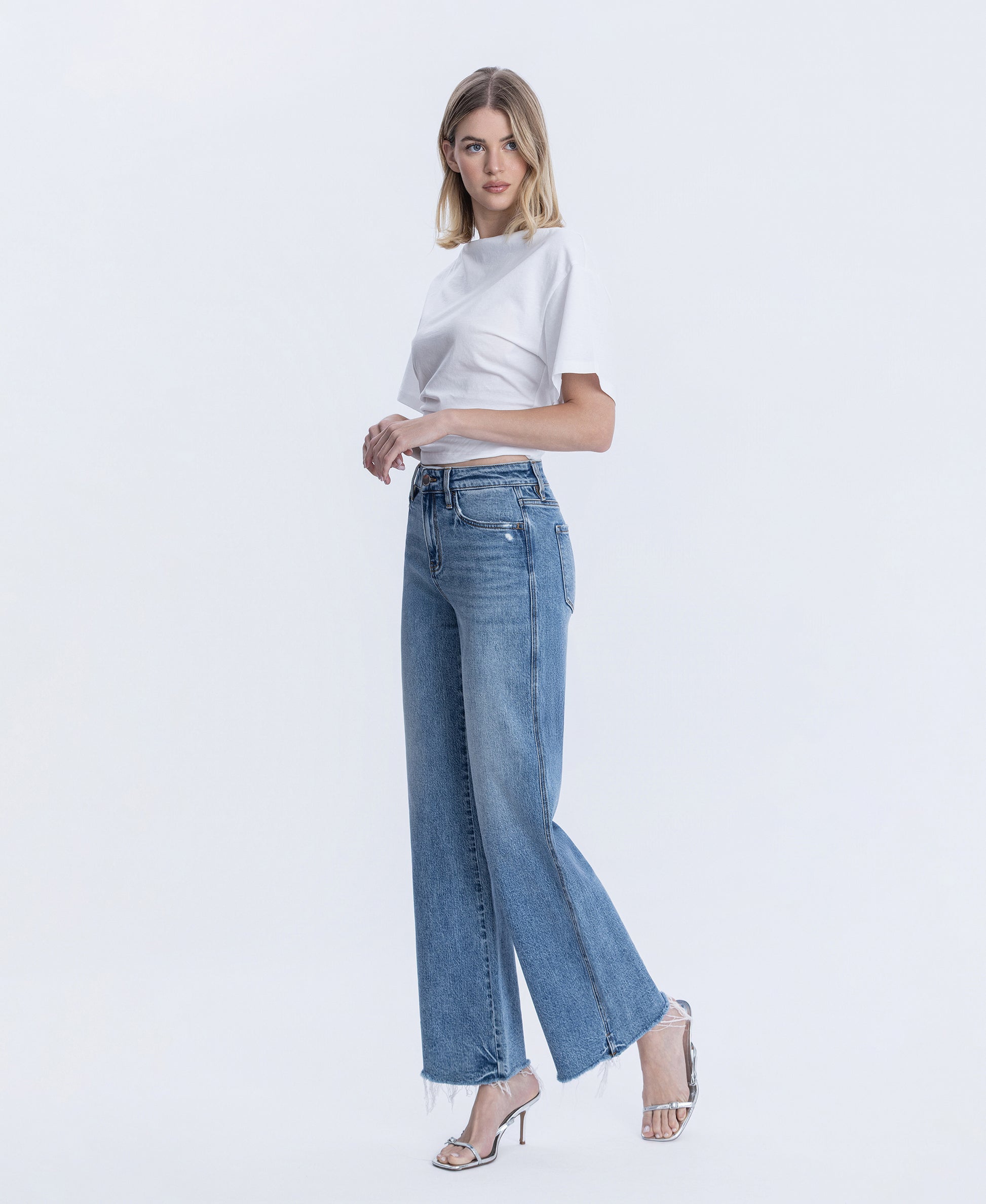 Left 45 degrees product image of Lively - High Rise Distressed Slit Hem Vintage Flare Jeans