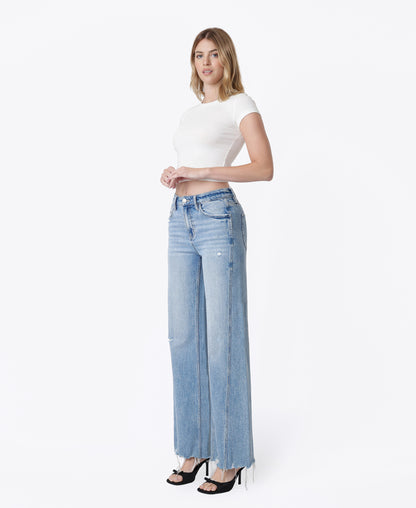 Left 45 degrees product image of Vibrant - High Rise Seam Detail Distressed Hem Wide Leg Jeans