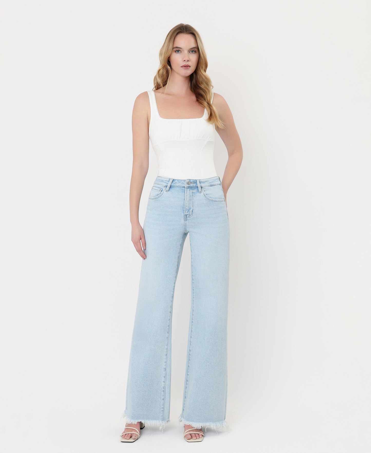 Front product images of Blue Ringer - High Rise Uneven Frayed Hem Wide Leg Jeans