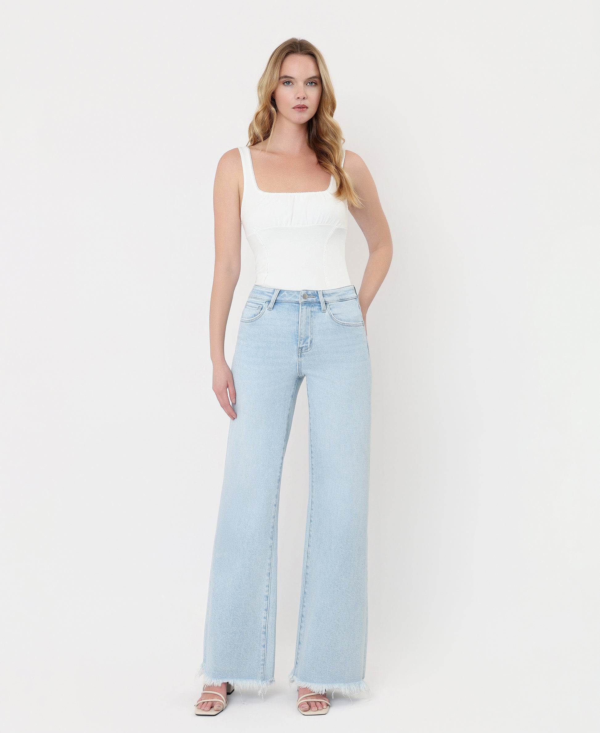 Front product images of Blue Ringer - High Rise Uneven Frayed Hem Wide Leg Jeans