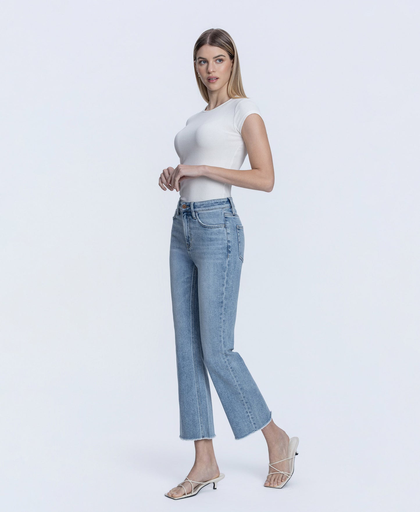 Left 45 degrees product image of Peaceable - High Rise Raw Hem Kick Flare Jeans