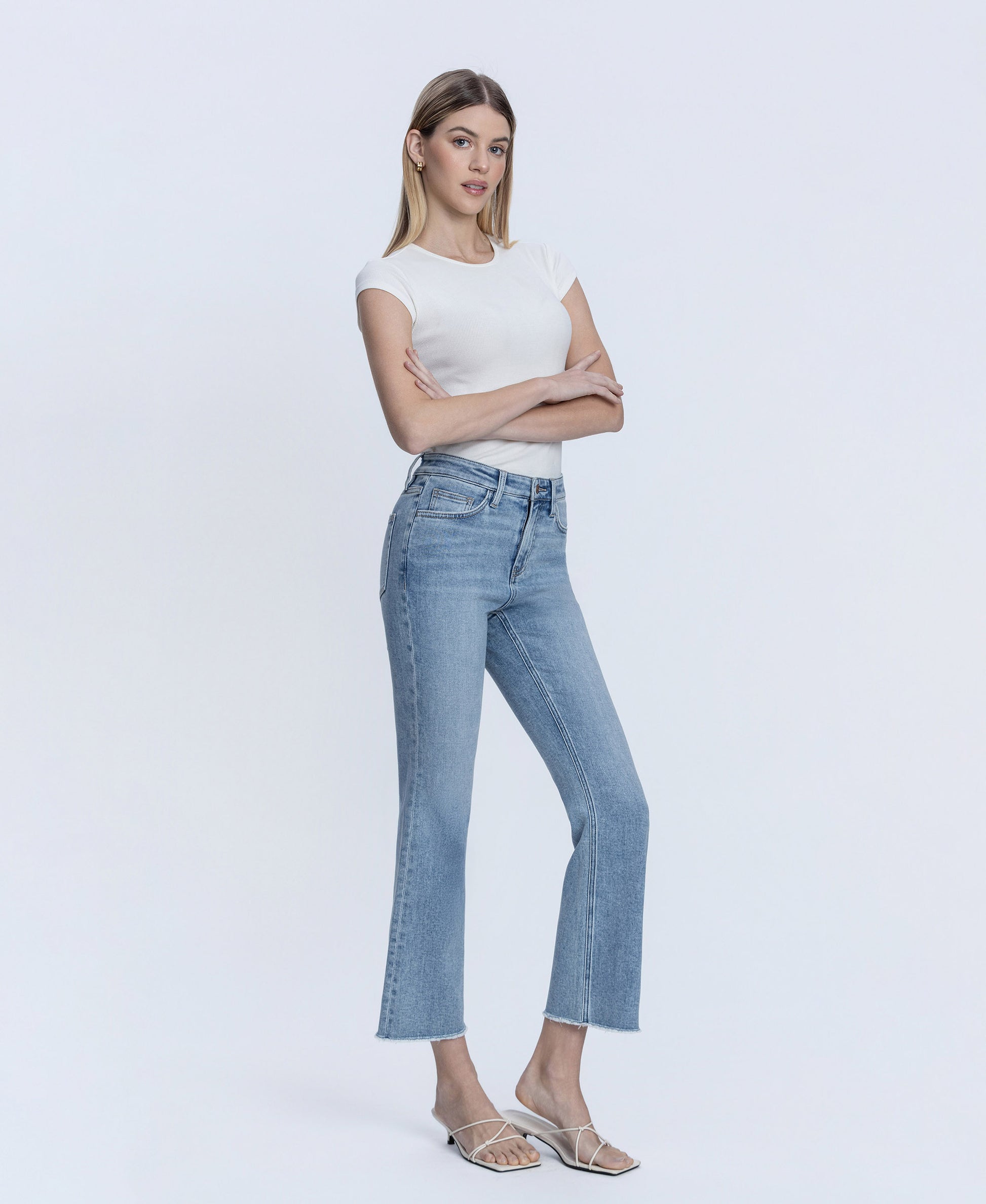 Right 45 degrees product image of Peaceable - High Rise Raw Hem Kick Flare Jeans
